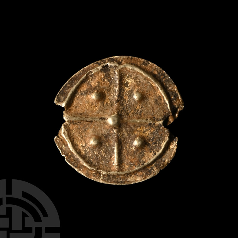 14th-16th century A.D. With high-relief central long cross, pellet to the centre...