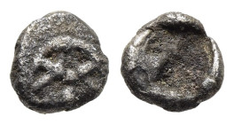 THRACO-MACEDONIAN REGION. Tetartemorion imitating the 'Wappenmünzen' types of Athens (6th century BC).

Obv: Wheel with three spokes.
Rev: Rough incus...