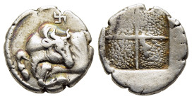 MACEDON. Akanthos. Tetrobol (circa 430-390 BC).

Obv: Forepart of bull left, head reverted; swastika above.
Rev: Quadripartite incuse square with gran...