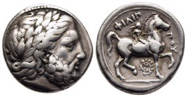 KINGS of MACEDON. Philip II (359-336 BC). Tetradrachm. Pella.

Obv: Laureate head of Zeus right.
Rev: ΦΙΛΙΠΠΟΥ.
Youth riding horse right, holding palm...