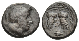 ATTICA. Athens. Ae (circa 322/17-307 BC). 

Obv: Head of Athena to right, wearing crested Attic helmet. 
Rev: ΑΘ Two owls standing facing each other; ...