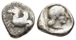 CORINTHIA. Corinth. Drachm (circa 500-450 BC). 

Obv: Ϙ Pegasos flying left. 
Rev: Archaic head of Aphrodite to right.

BCD Corinth 28-29. HGC 4, 1860...