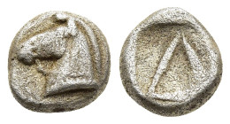 CORINTHIA. Corinth. Diobol (circa 500-450 BC). 

Obv: Head of a bridled horse to left. 
Rev: Large Δ within an incuse square. 

BCD Corinth 37. HGC 4,...