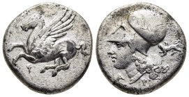 CORINTHIA. Corinth. Stater (Circa 345-307 BC).

Obv: Pegasos flying right; below, Ϙ.
Rev: Head of Athena left, wearing corinthian helmet decorated wit...