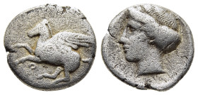 CORINTHIA. Corinth. Drachm (circa 345-307 BC). 

Obv: Ϙ Pegasos flying left. 
Rev: Head of Aphrodite to left.

BCD Corinth 147 var. (hairstyle of Aphr...