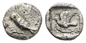 SIKYONIA. Sikyon. Hemiobol (circa 450-425 BC). 

Obv: Dove standing left, cleaning claw.
Rev: Dove flying left; value mark H above head.

BCD Peloponn...