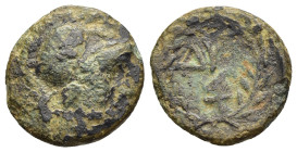 ACHAIA. Dyme. Ae (circa 225-200 BC).

Obv: Head of Athena right, wearing corinthian helmet.
Rev: ΔY above ivy leaf(?), all within laurel wreath.

HGC ...