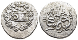 MYSIA. Pergamon. Cistophoric Tetradrachm (circa 85-76 BC). 

Obv: Serpent crawling from cista mystica; all within ivy-wreath.
Rev: Bow-case with serpe...