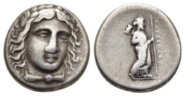 SATRAPS of CARIA. Maussolos (circa 377/6-353/2 BC). Drachm. Halikarnassos.

Obv: Laureate head of Apollo facing slightly right.
Rev: MAYΣΣΩΛΛON.
Zeus ...