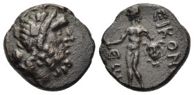 LYCAONIA. Iconium. Ae (1st century BC).

Obv: Laureate head of Zeus right.
Rev: ЄIKONI / ЄWN.
Perseus standing left, holding harpa and head of Medusa....