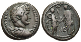 EGYPT. Alexandria. Hadrian (117-138). Tetradrachm. Dated RY 15 (130/1).

Obv: ΑVΤ ΚΑΙ ΤΡΑI ΑΔΡΙΑ СЄ
Laureate, draped and cuirassed bust right.
Rev: L ...