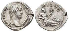 HADRIAN (117-138). Denarius. Rome. "Travel Series" issue.

Obv: HADRIANVS AVG COS III P P
Bare head right.
Rev: NILVS
Nilus reclining right on crocodi...