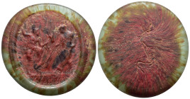 ROMAN TIMES. Fused glass Medallion (circa 2nd century AD).

A lovely piece made out of fused light greenish and red glas, depicting Poseidon and Zeus ...