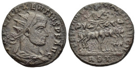 Maxentius (307-312). Follis. Rome. 

Obv: IMP C MAXENTIVS P F AVG.
Radiate, draped and cuirassed bust right.
Rev: FEL PROC ES CONS III AVG N.
Maxentiu...