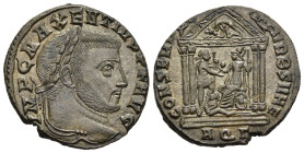 MAXENTIUS (307-312). Follis. Aquileia.

Obv: IMP C MAXENTIVS P F AVG.
Laureate head right.
Rev: CONSERV VRB SVAE // AQΓ.
Roma seated left on shield, h...