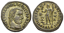 LICINIUS I (308-324). Follis. Alexandria.

Obv: IMP C VAL LICIN LICINIVS P F AVG.
Laureate head right.
Rev: IOVI CONSERVATORI AVGG / K - Ω / X / A // ...