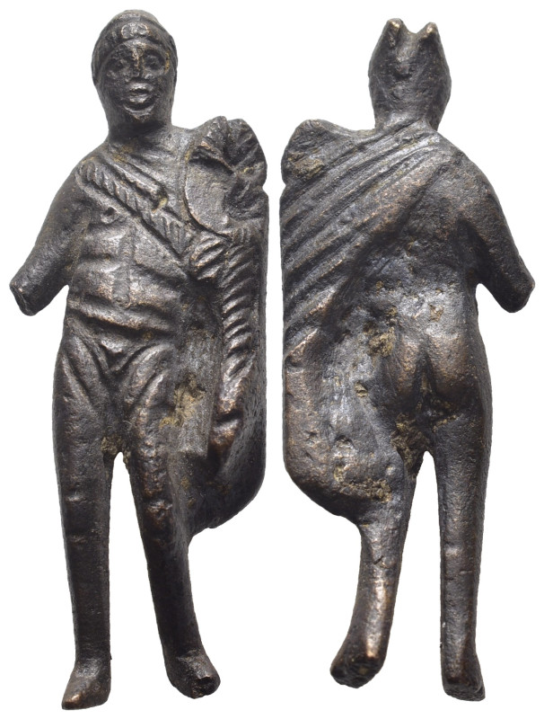 A ROMAN BRONZE FIGURINE (ca. 3rd- 4rd century AD).

A figurine of a standing rom...