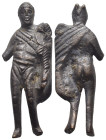 A ROMAN BRONZE FIGURINE (ca. 3rd- 4rd century AD).

A figurine of a standing roman soldier, wearing pannonian headdress and sagum over his left should...