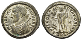 CONSTANTINE I THE GREAT (307-337). Follis. Cyzicus.

Obv: IMP CONSTANTINVS AVG.
Laureate and draped bust left with sceptre, globe and mappa.
Rev: IOVI...