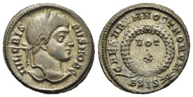 CRISPUS (Caesar, 316-326). Follis. Siscia.

Obv: IVL CRISPVS NOB C.
Laureate head right.
Rev: CAESARVM NOSTRORVM // B SIS (thunderbolt?).
VOT / X in t...