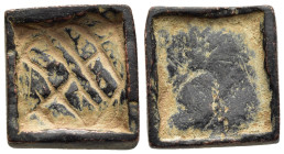 BYZANTINE EMPIRE. Commercial weight (11th century AD). Uncertain standard.

A square bronze weight, transformed from an Anonymous Follis (SB 1823), in...