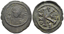 JUSTINIAN I (527-565). Half Follis. Cyzicus. Dated RY 13 (539/40).

Obv: D N IVSTINIANVS P P AVG.
Helmeted and cuirassed bust facing, holding globus c...