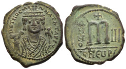 TIBERIUS II CONSTANTINE (578-582). Follis. Antioch.

Obv: Crowned facing bust, wearing consular robe, holding mappa and eagle-tipped sceptre.
Rev: Lar...