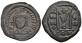 MAURICE TIBERIUS (582-602). Follis. Constantinople. Dated RY 8 (589/590).

Obv: D N MAVRICI TIЬЄRI P P AVG.
Helmeted and cuirassed bust facing, holdin...