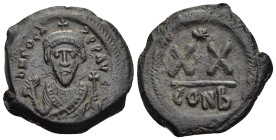 PHOCAS (602-610). Half Follis. Constantinople.

Obv: D N FOCAS PERP AVC.
Crowned bust facing, wearing consular robes and holding mappa and cross.
Rev:...