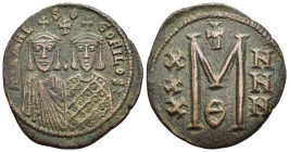 MICHAEL II THE AMORIAN with THEOPHILUS (820-829). Follis. Constantinople.

Obv: MIXAHL S Î˜Ð„OFILOS.
Crowned facing busts of Michael and Theophilus; c...