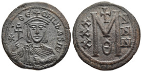 THEOPHILUS (829-842). Follis. Constantinople.

Obv: ✷ ΘЄOFIL ЬASIL.
Crowned and draped bust facing, holding patriarchal cross and akakia.
Rev: Large M...