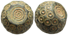 ISLAMIC WEIGHTS (circa 10-13th centuries). Commercial weight of 20 Dirhams or 2 Uqiya. Bronze.

A coin weight in the form of a polyhedron; decorated w...