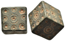 ISLAMIC WEIGHTS (circa 10-13th centuries). Commercial weight of 10 Dirhams or 1 Uqiya. Bronze.

A cubic islamic coin weight; each face decorated with ...