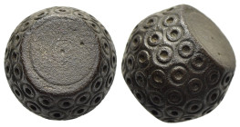 ISLAMIC WEIGHTS (circa 10-13th centuries). Commercial weight of 5 Dirhams or 1/2 Uqiya. Bronze.

A barrel shaped islamic coin weight; decorated with n...