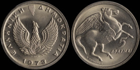GREECE: 5 Drachmas (1973) in copper-nickel. Phoenix and inscription "ΕΛΛΗΝΙΚΗ ΔΗΜΟΚΡΑΤΙΑ" on obverse. Pegasus on reverse. Inside slab by PCGS "MS 68"....