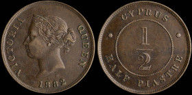 CYPRUS: 1/2 Piastre (1882 H) in bronze. Crowned head of Queen Victoria facing left on obverse. Denomination within circle on reverse. (KM 2) & (Fitiki...