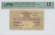 CYPRUS: 10 Shillings (23.9.1946) in maroon on pink and olive unpt. Portrait of King George VI at top center on face. S/N: "F/5 023172". Printed by TDL...