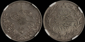 EGYPT: 5 Qirsh [AH1293//10 W (1885)] in silver (0,833). Flower at right of toughra on obverse. Legend on reverse. Inside slab by NGC "MS 62". Cert num...