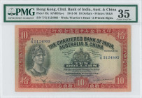 HONG KONG: 10 Dollars (12.2.1948) in black and red on green unpt. Helmeted warriors head at left and coat of arms at center on face. S/N: "T/G 3124805...