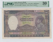 INDIA: 1000 Rupees (ND 1937) in lilac, violet and green. King George VI at right on face. S/N: "A/6 411499". WMK: King George VI. Inside holder by PMG...