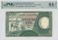 INDONESIA: 10000 Rupiah (1964) in green. Two fishermen at left on face. S/N: "UQM00947". WMK: Water buffalo. Printed by PNPK. Inside holder by PMG "Ch...