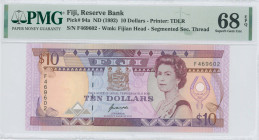 FIJI: 10 Dollars (ND 1992) in purple and brown on multicolor unpt. Modified portrait of Queen Elizabeth II at right, coat of arms at center, artifact ...