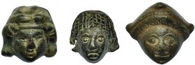 ROMA. Lote de tres caras. Siglo II-III d.C. Bronce. Altura 23; 26 y 28 mm.