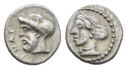 Cilicia, Nagidos. Ca. 420-280 B.C. AR obol (9mm, 0.78 g). ΝΑΓΙ. Head of bearded Dionysos left. / Head of Aphrodite left.
