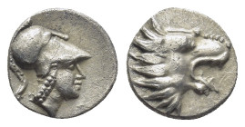 PISIDIA, Selge. Circa 350-300 BC. AR Obol. (0.7 Gr. 9mm.) Head of Athena to left, wearing crested Corinthian helmet. Rev: Head of a lion to left.