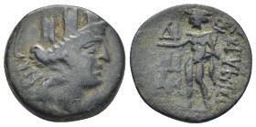 Cilicia, Korykos, 1st century BC. Æ (20mm, 6.3 g). Turreted head of Tyche r.; AN behind. R/ Hermes standing l., holding phiale and keykeion; ΔI//NI/AN...