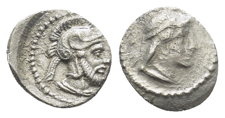 Cilicia, Satraps, Datames AR Obol. (10mm, 0.6 g) Tarsos, 378-372 BC. Helmeted he...