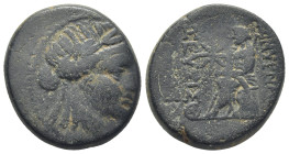 IONIA. Smyrna. (Circa 75-50 BC). Ae. (24mm, 13.7 g) Obv: Laureate head of Apollo right Rev: The poet Homer seated left, holding scroll; star above kne...