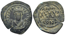 Phocas (602-610), AE follis, issued 605 - 606. Constantinople, 1st Officina, (15.9 g, 33mm). Obv: DN FOCAS PЄRP AUC, Crowned bust facing, wearing cons...
