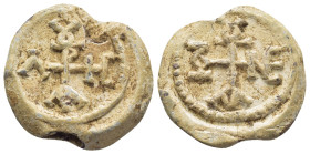 BYZANTINE LEAD SEAL. (23mm, 11.9 g) Obv: Cruciform invocative monogram. Rev: Cruciform invocative monogram.